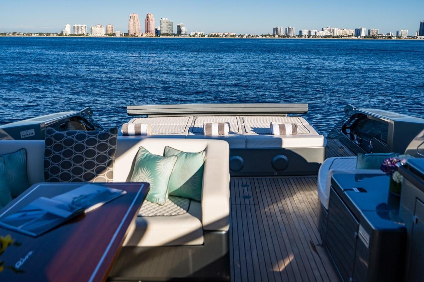 a group of boats on a dock aboard 2021 RIVA 76' BAHAMAS Yacht for Sale