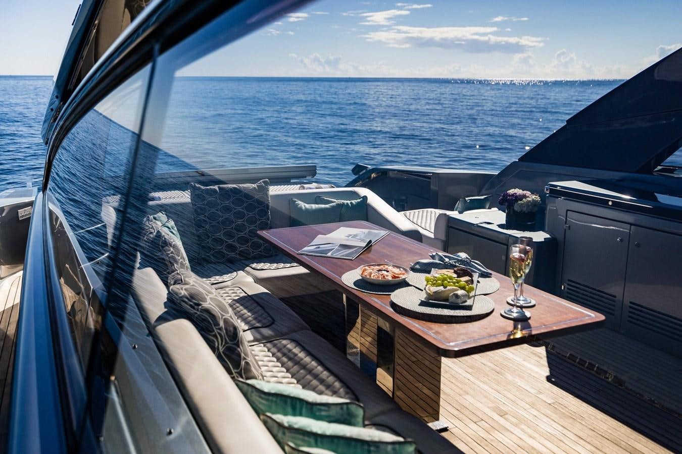 a table on a boat aboard 2021 RIVA 76' BAHAMAS Yacht for Sale