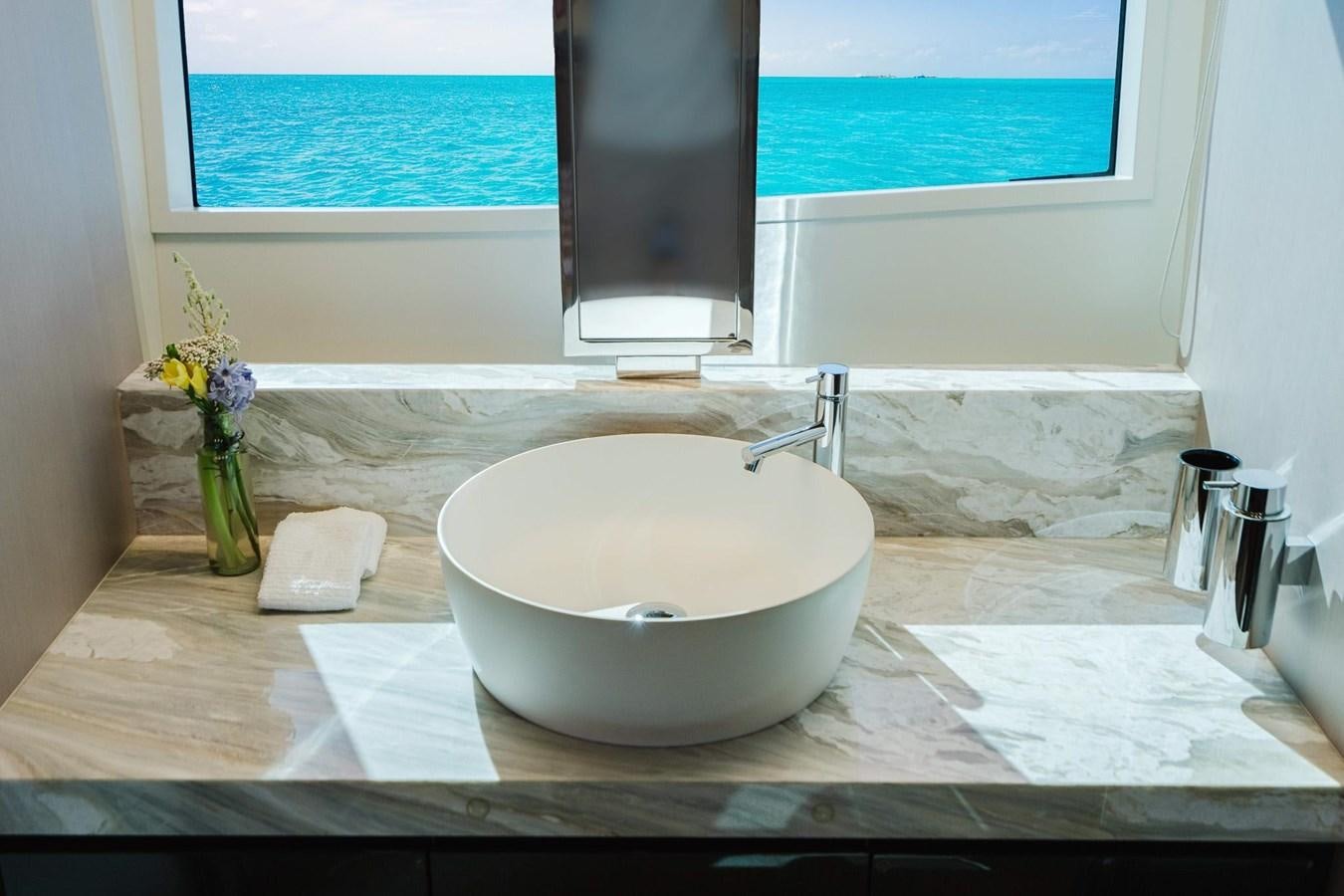 a sink in a bathroom aboard 2021 RIVA 76' BAHAMAS Yacht for Sale