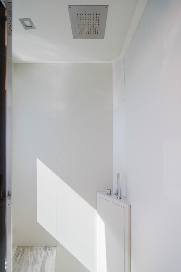 a white wall with a light switch aboard 2021 RIVA 76' BAHAMAS Yacht for Sale