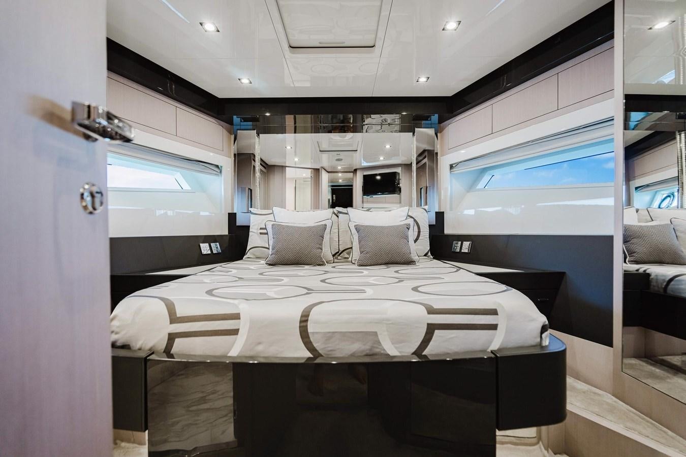 a bed in a room aboard 2021 RIVA 76' BAHAMAS Yacht for Sale