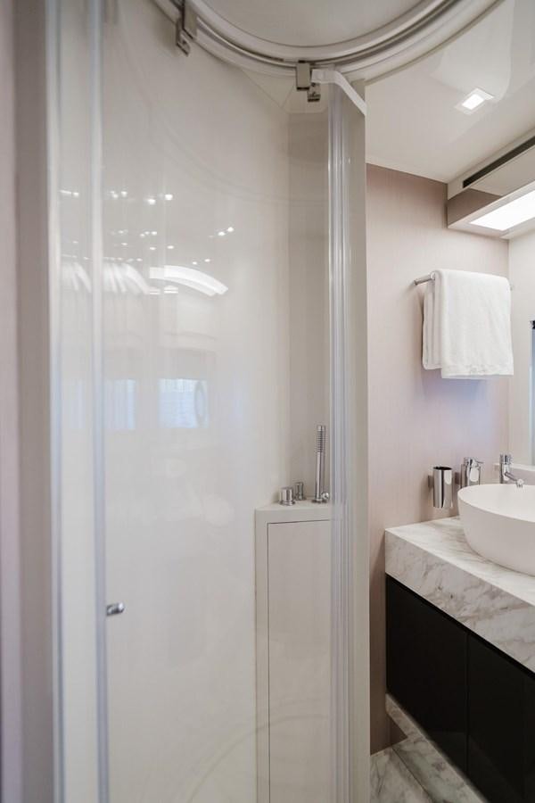 a bathroom with a shower and sink aboard 2021 RIVA 76' BAHAMAS Yacht for Sale