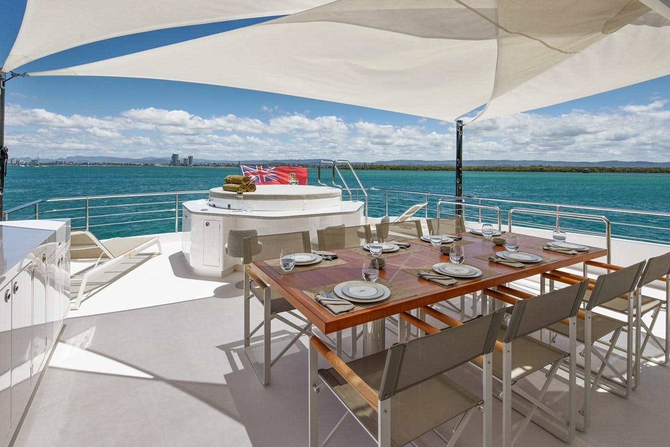 a table set for a meal on a boat aboard ASKARI Yacht for Sale