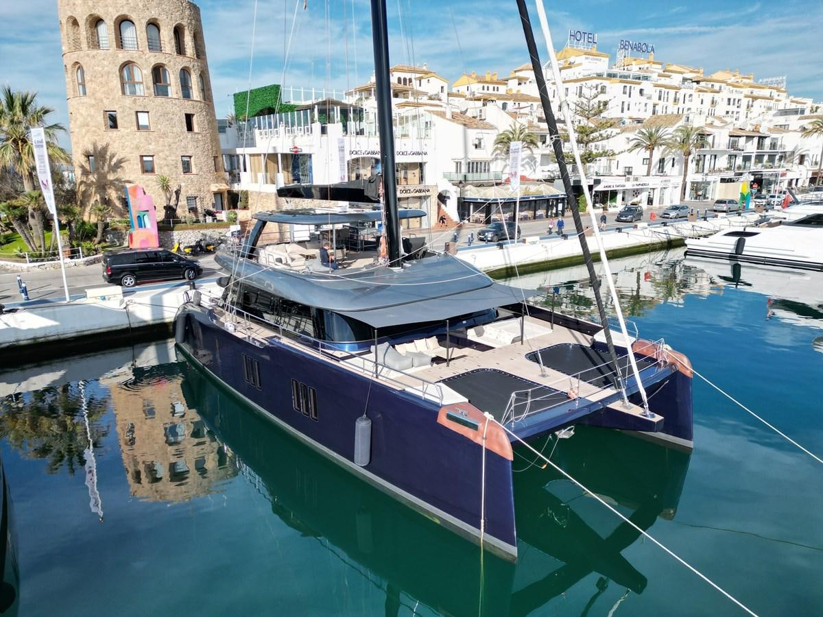 boats docked in a harbor aboard NAOMA Yacht for Sale