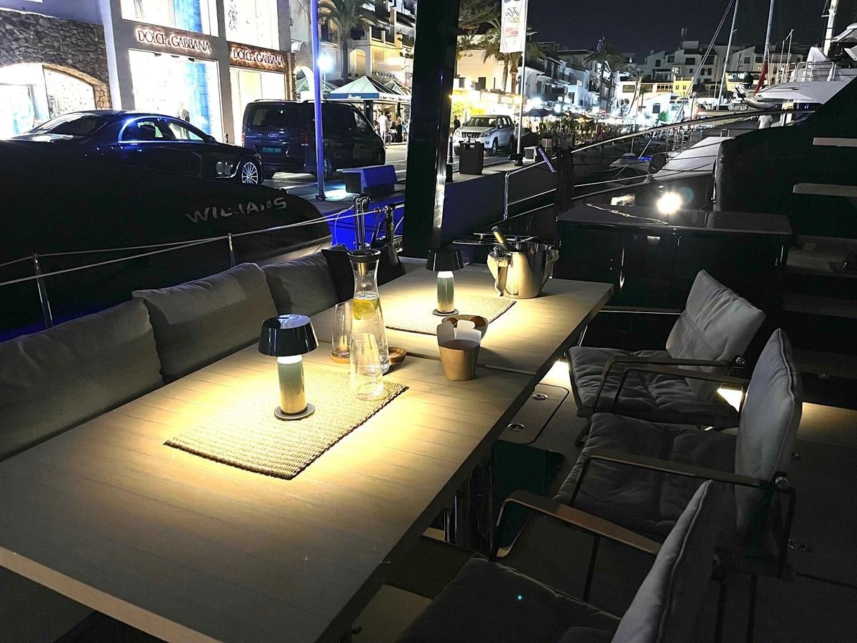 a table with beverages on it aboard NAOMA Yacht for Sale