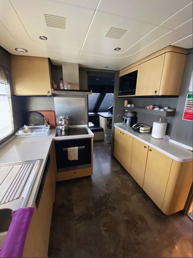 a kitchen with a sink and cabinets aboard SAADET SULTAN Yacht for Sale