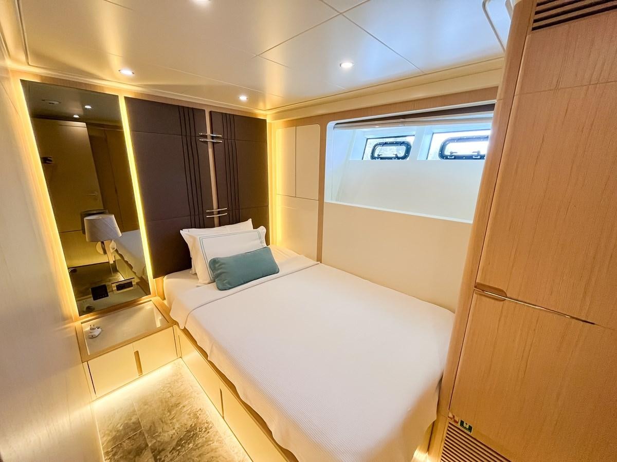 a hotel room with a bed aboard SAADET SULTAN Yacht for Sale
