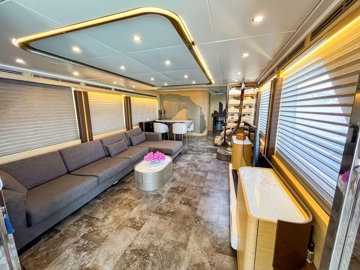a living room with a couch and a table aboard SAADET SULTAN Yacht for Sale
