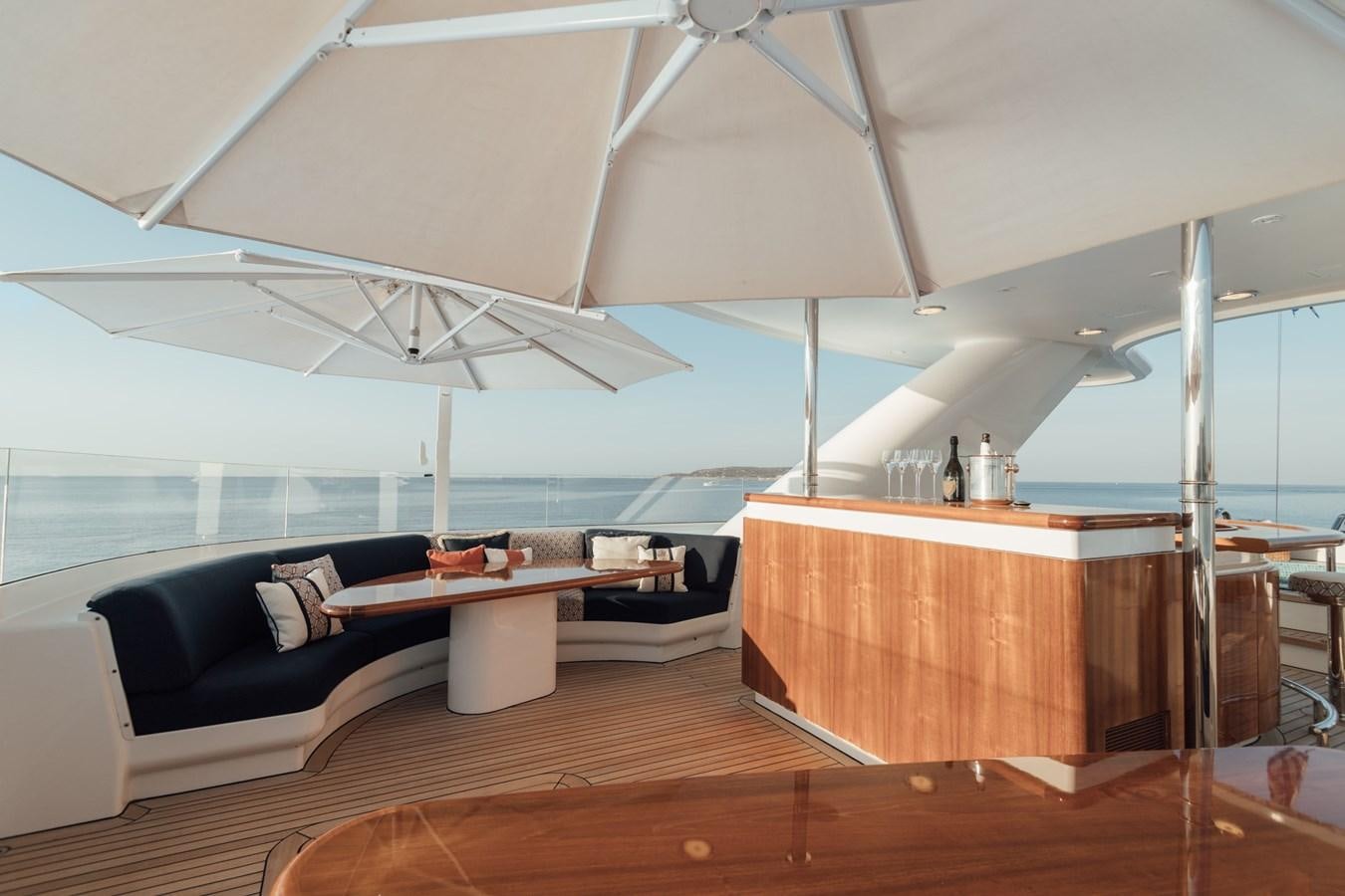 a living room with a large window aboard HERCULES Yacht for Sale