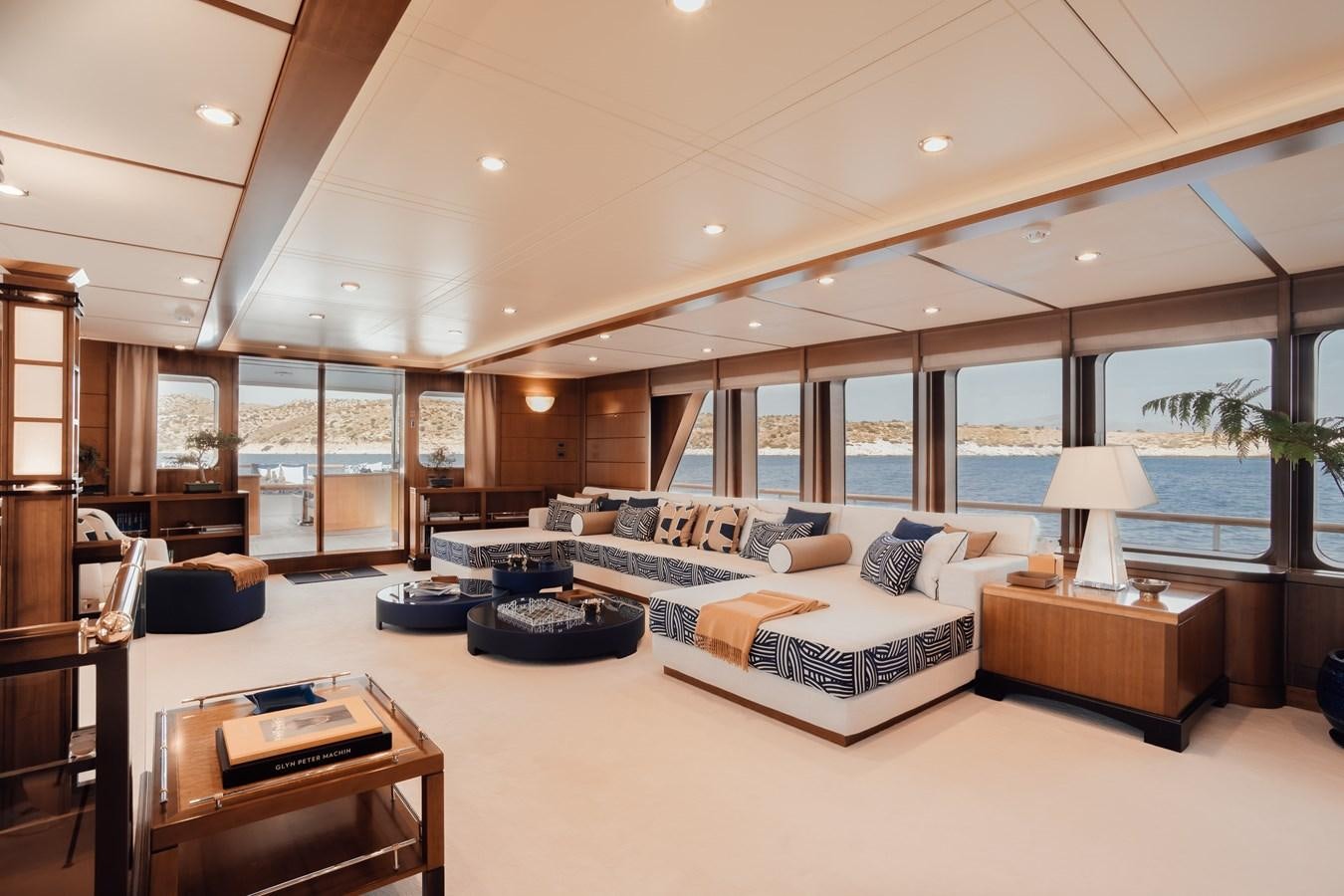 a large living room with a large window aboard HERCULES Yacht for Sale