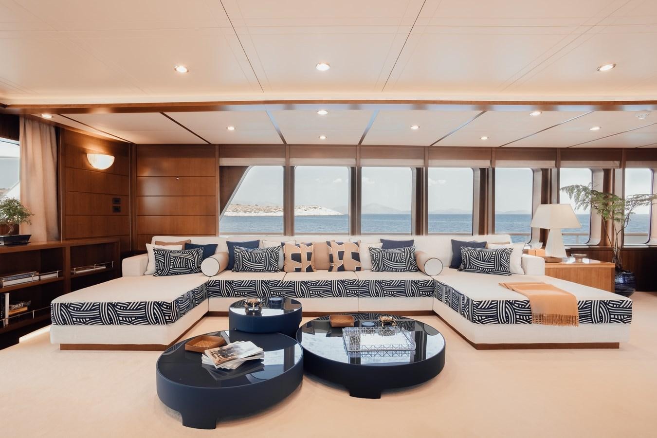 a large living room with a large window aboard HERCULES Yacht for Sale