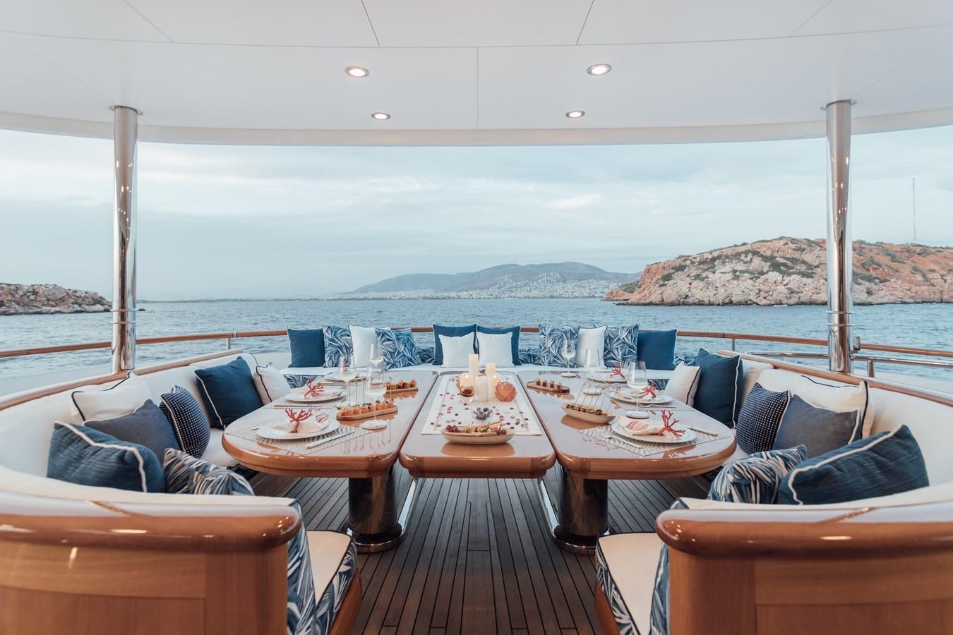 a table with food on it aboard HERCULES Yacht for Sale