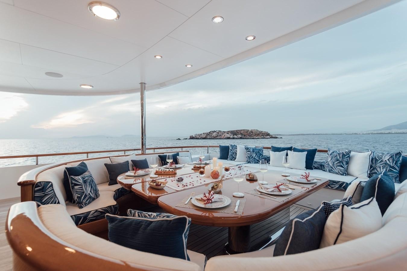 a large living room with a large ocean view aboard HERCULES Yacht for Sale