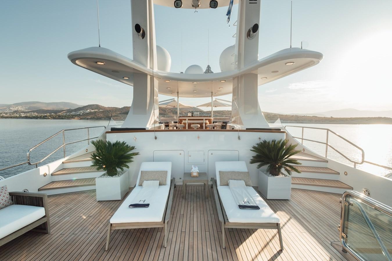 a room with a table and chairs aboard HERCULES Yacht for Sale