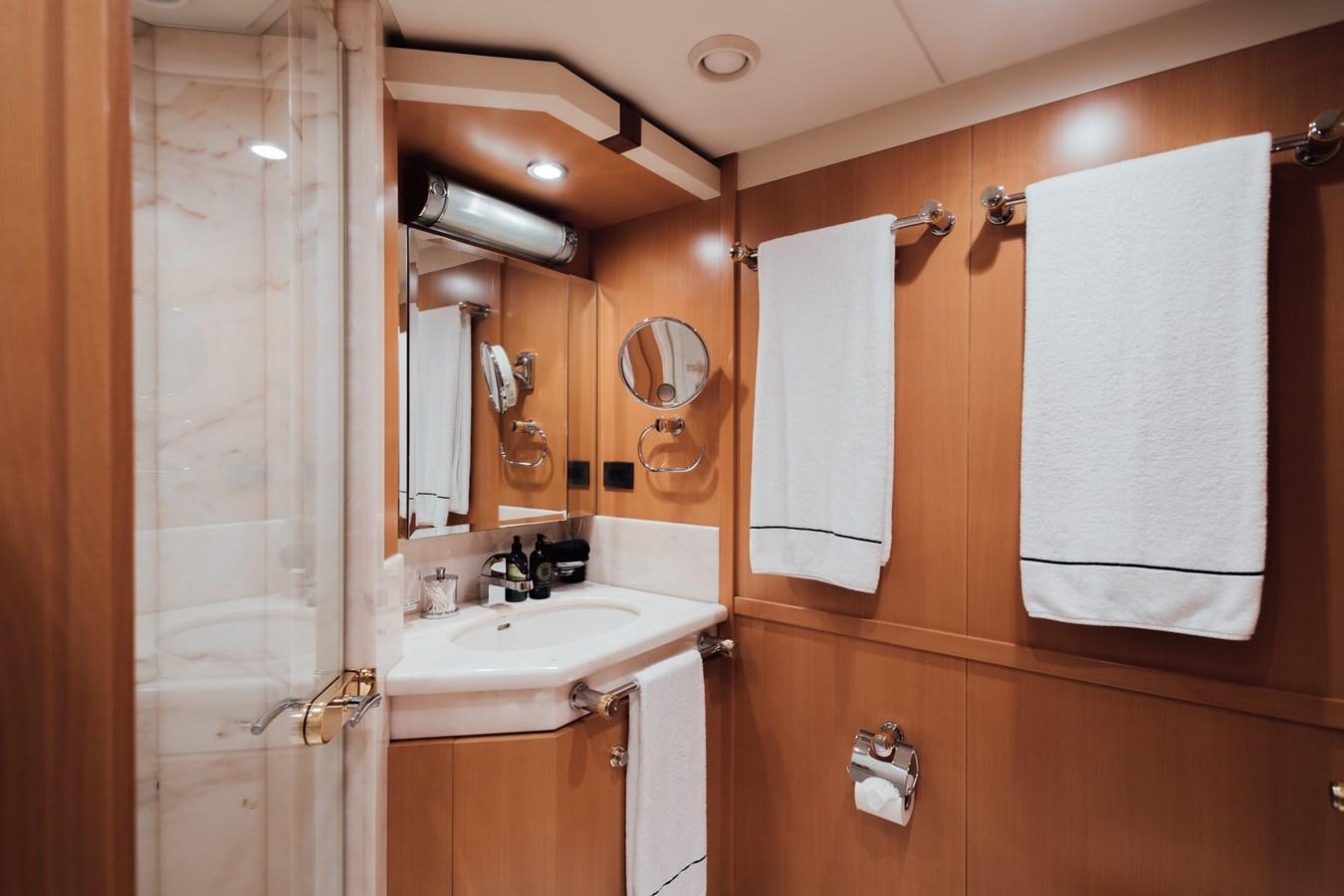 a bathroom with a sink and a mirror aboard HERCULES Yacht for Sale
