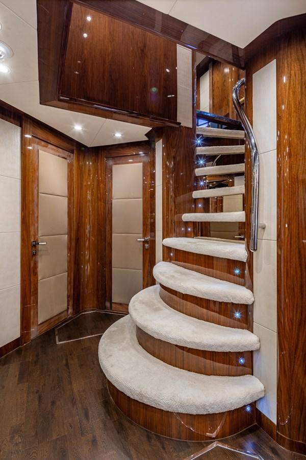 a chair in a room aboard IMAN Yacht for Sale