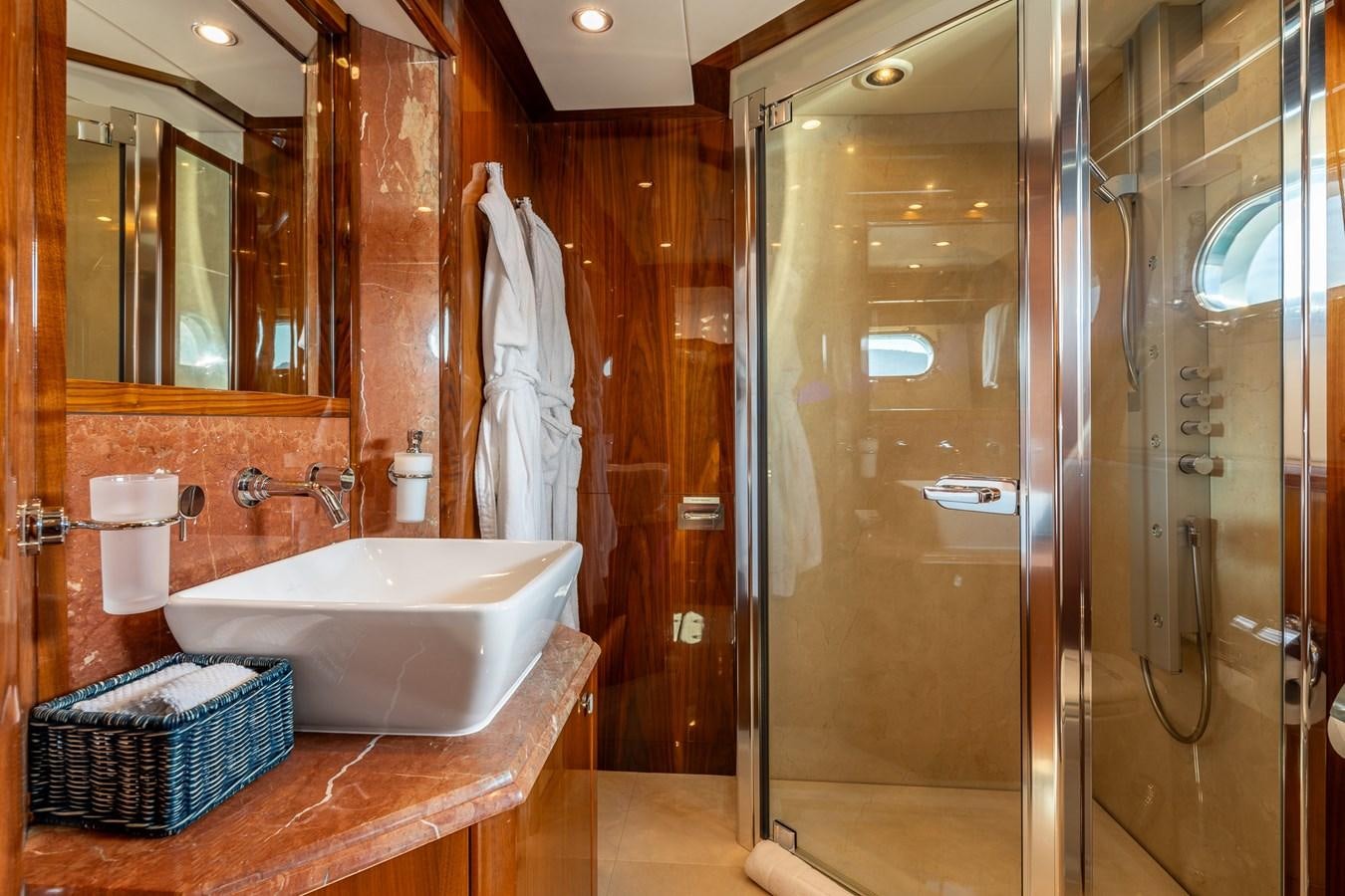 a bathroom with a bathtub and shower aboard IMAN Yacht for Sale