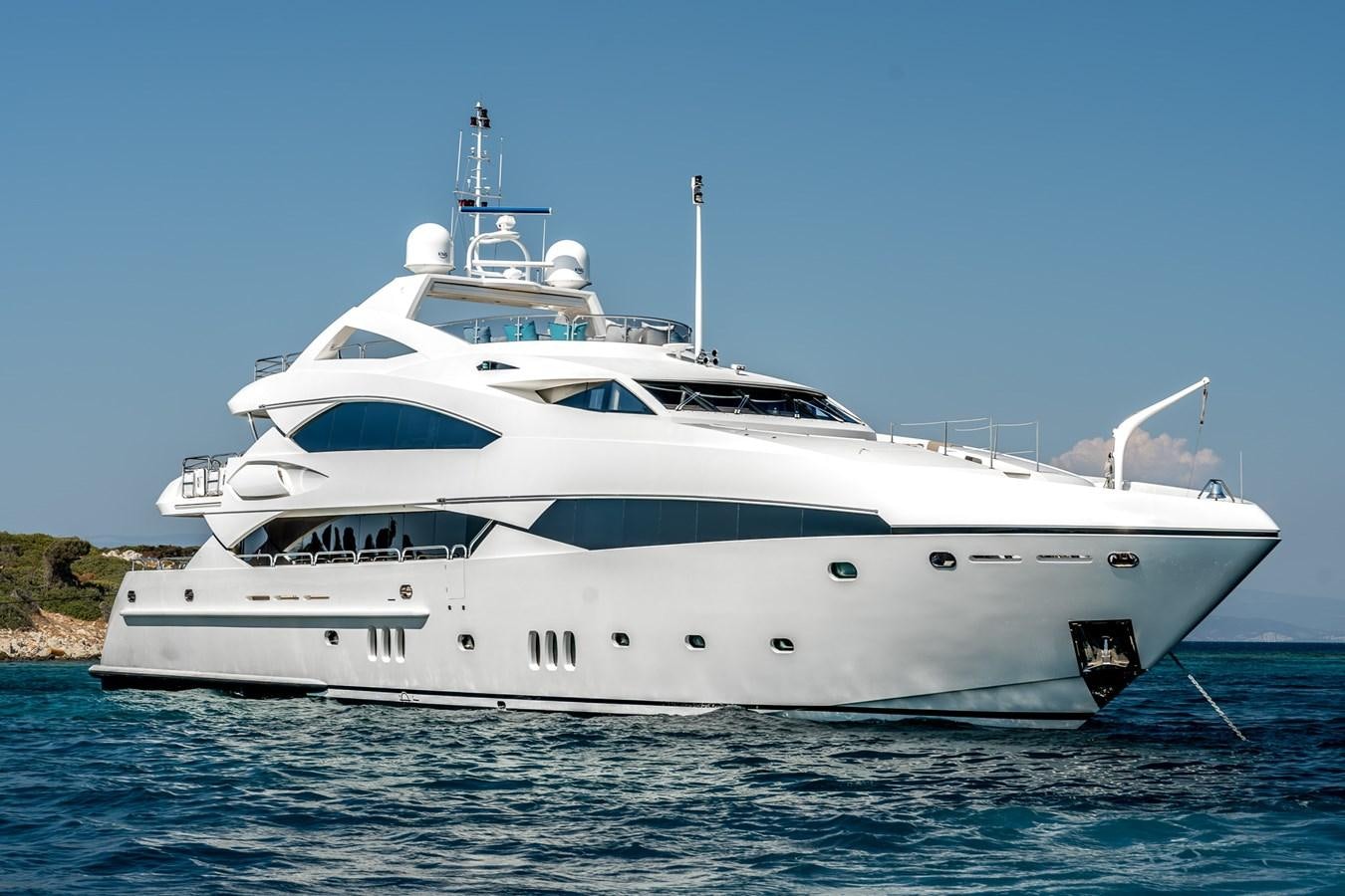 a white yacht on the water aboard IMAN Yacht for Sale