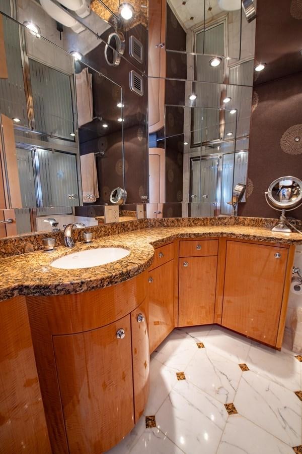 a bathroom with a sink and a shower aboard DESTINY IV Yacht for Sale