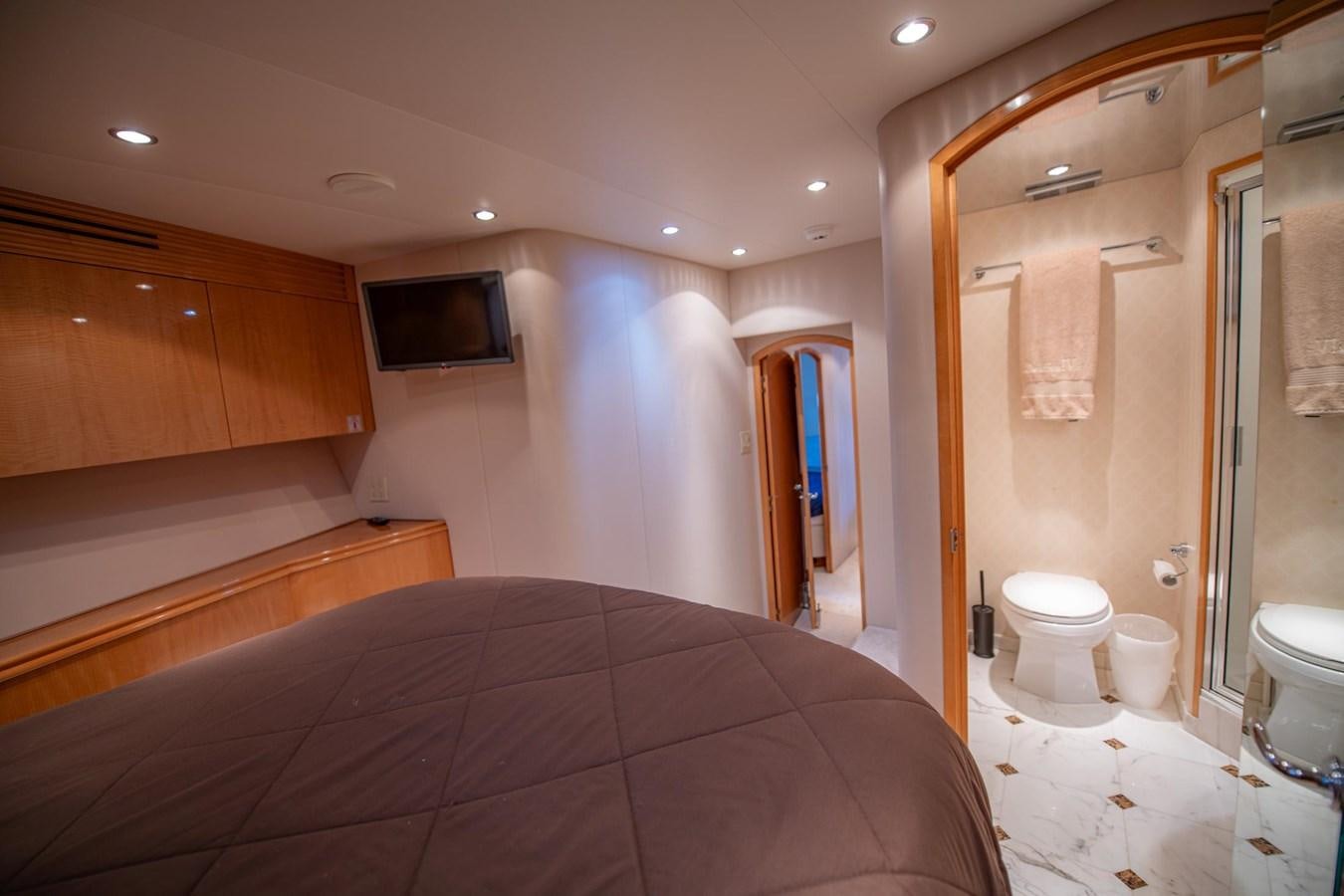 a bathroom with a large bed aboard DESTINY IV Yacht for Sale