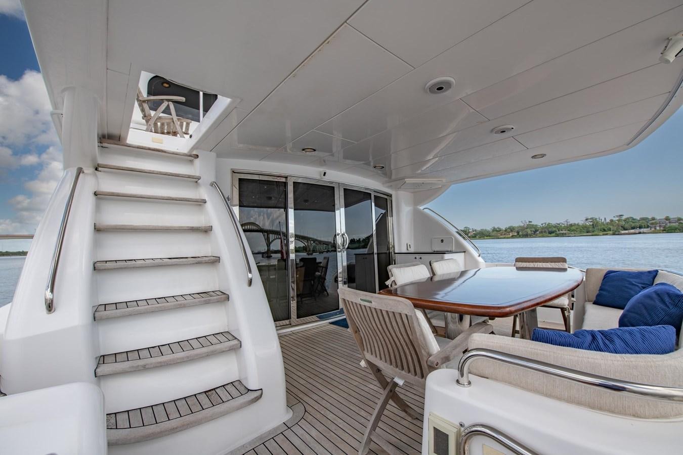 a boat on a deck aboard DESTINY IV Yacht for Sale