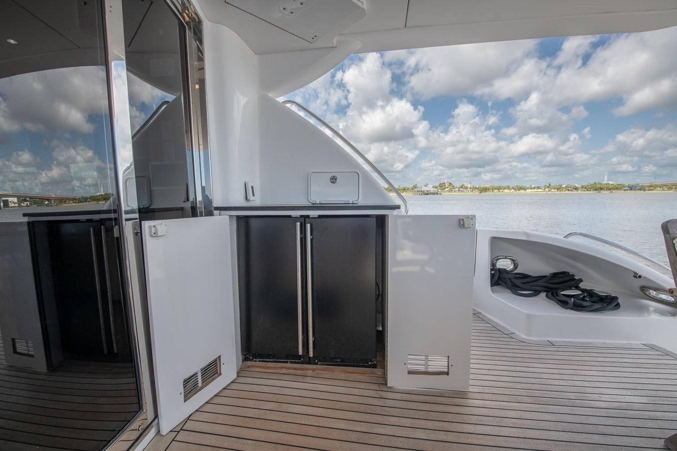 a kitchen with a large window aboard DESTINY IV Yacht for Sale