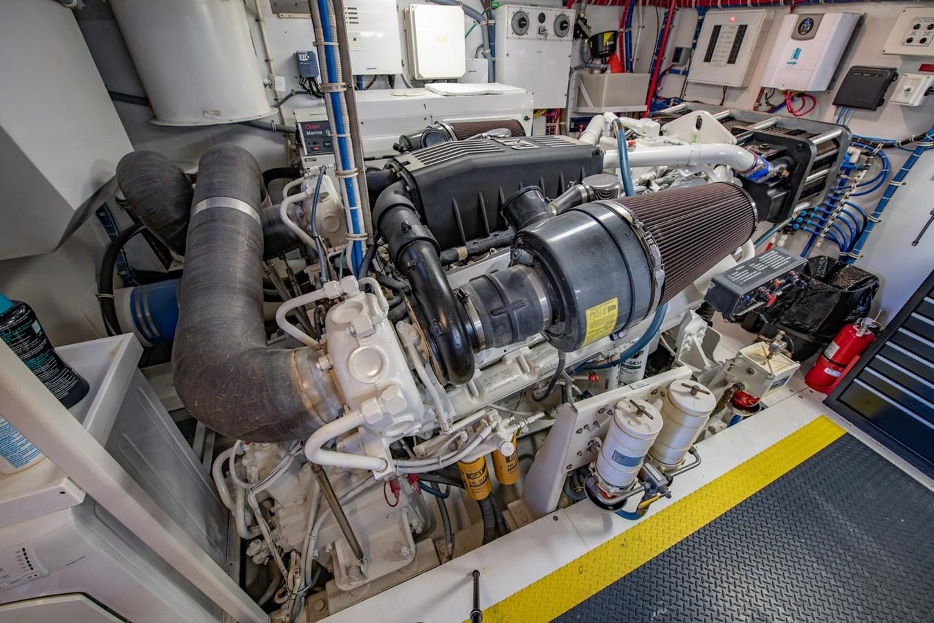 a machine with a large metal cylinder aboard DESTINY IV Yacht for Sale