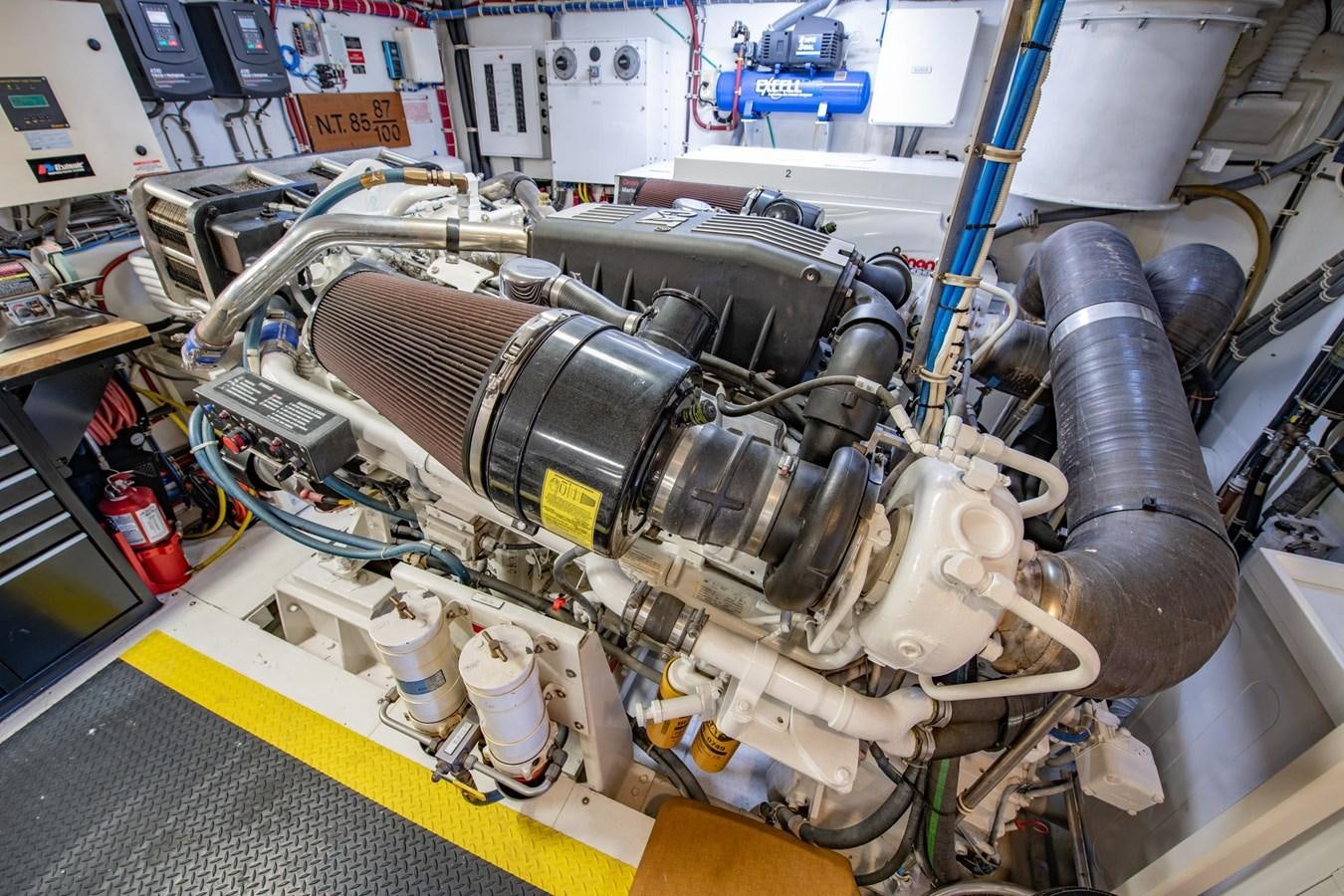 a machine with a large metal cylinder aboard DESTINY IV Yacht for Sale