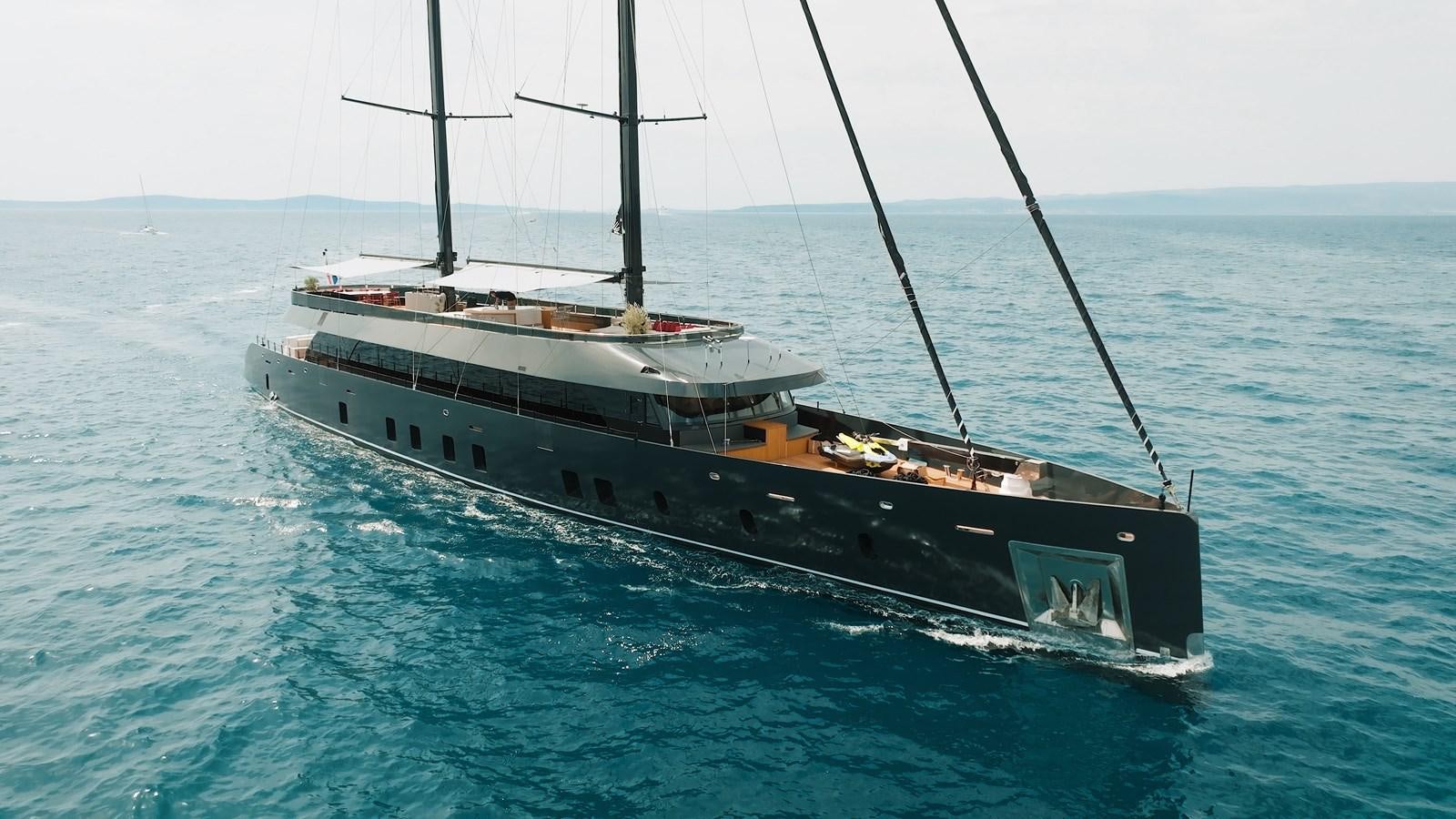a large ship in the water aboard REPOSADO Yacht for Sale