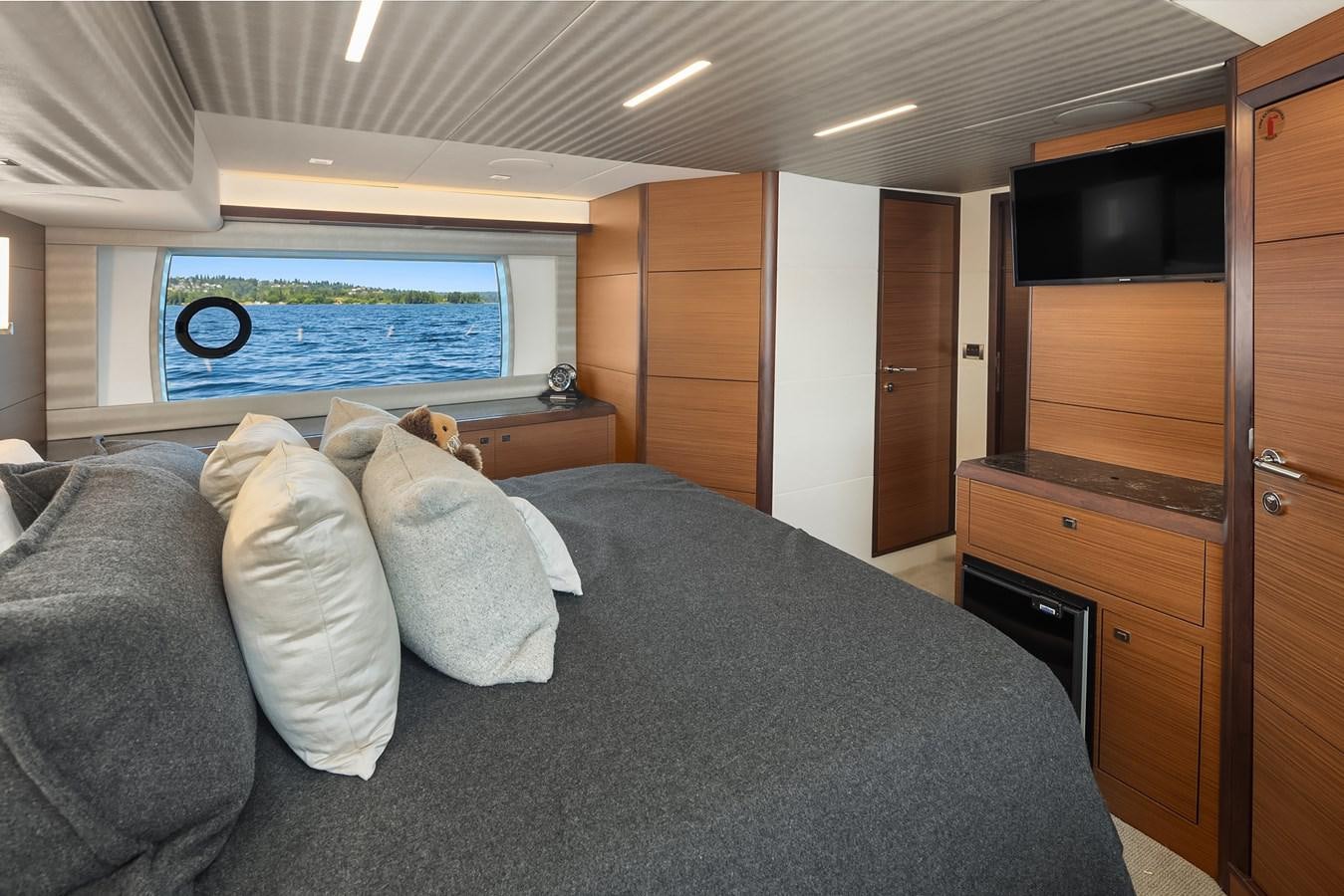 a bed in a room aboard THRU & THRU Yacht for Sale
