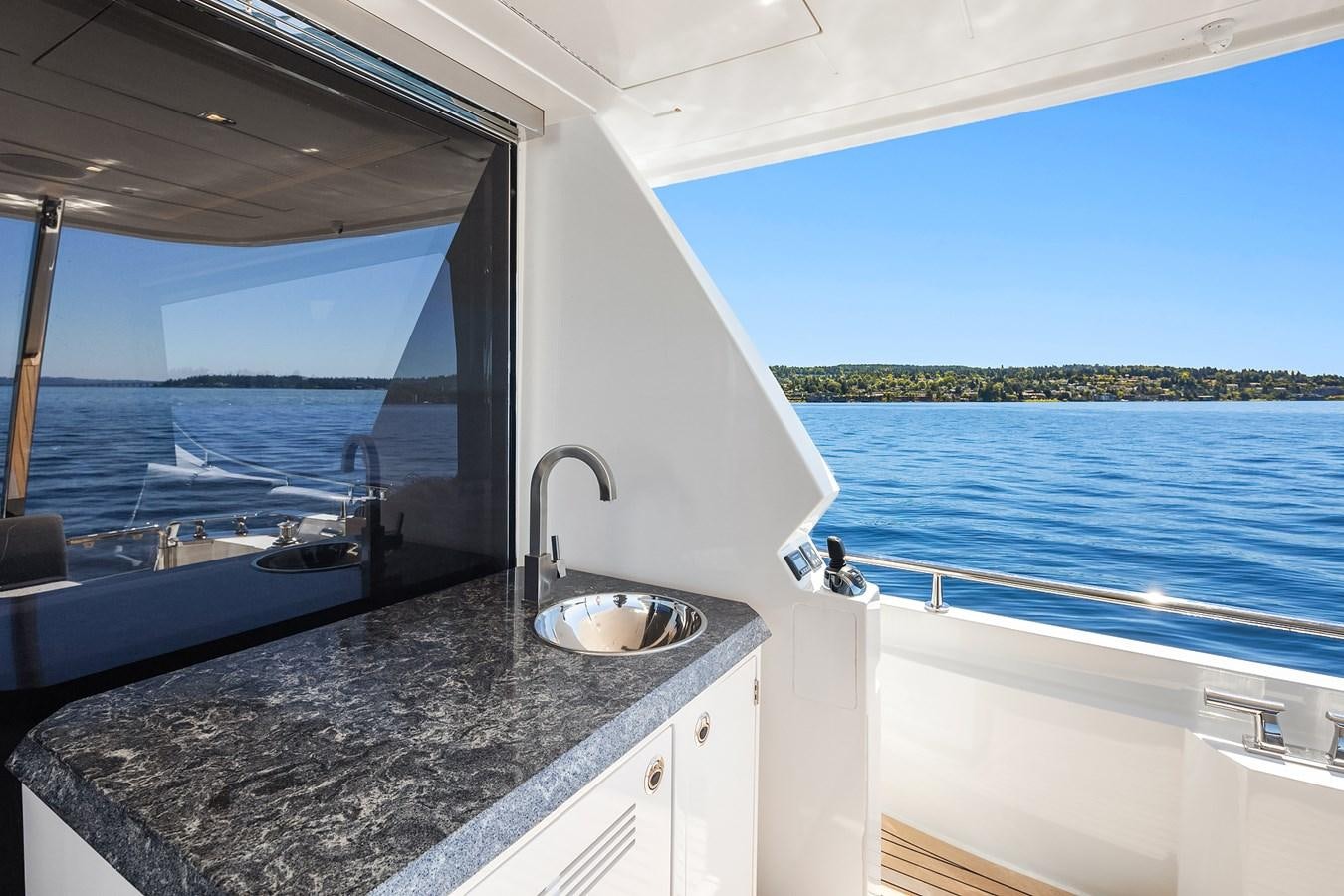 a large bathroom with a large window aboard THRU & THRU Yacht for Sale
