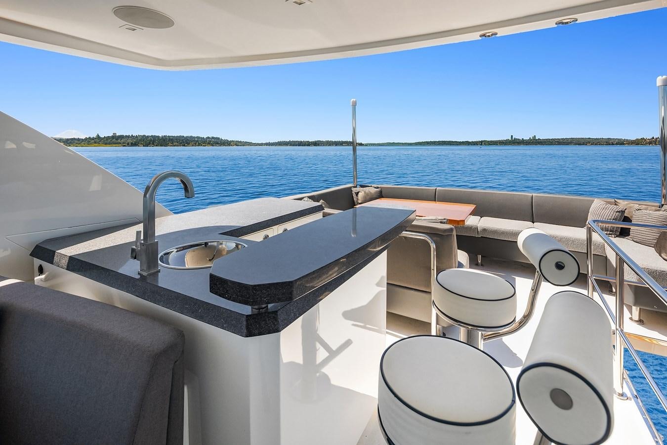 a boat with a sink and a chair on a boat aboard THRU & THRU Yacht for Sale