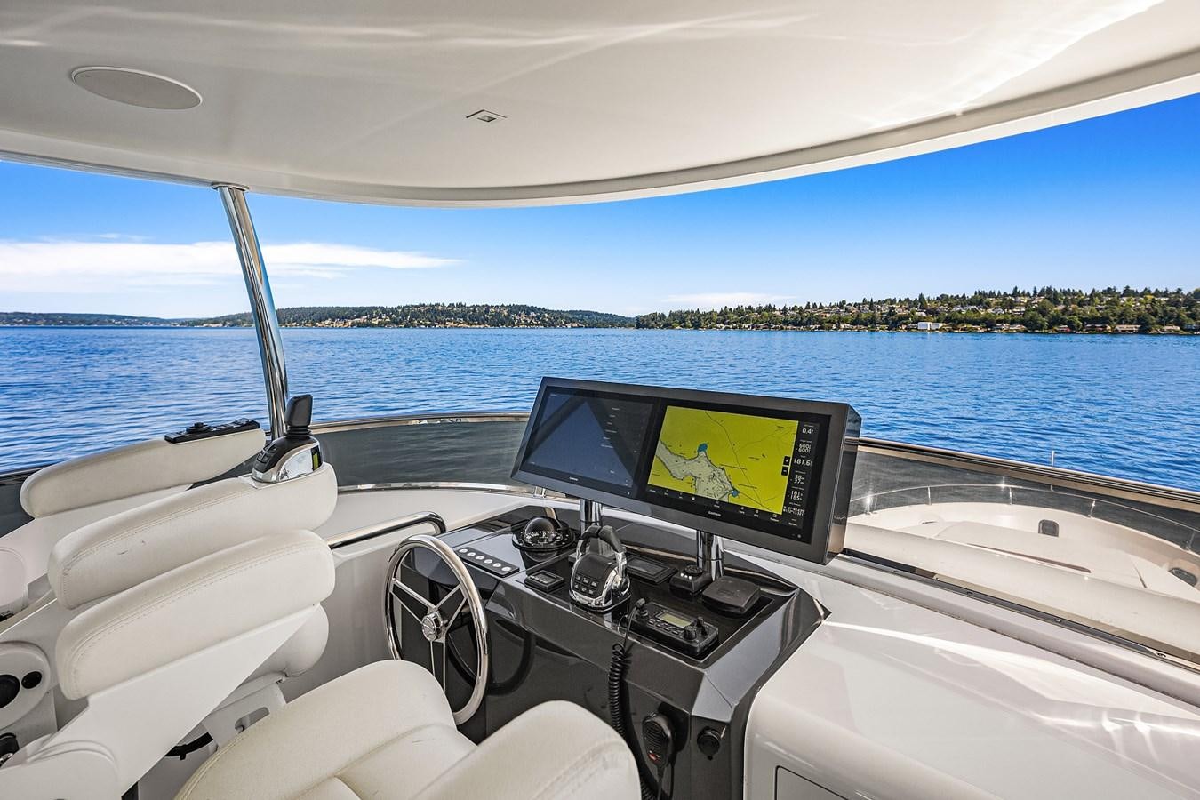 a boat with a monitor and a laptop on it aboard THRU & THRU Yacht for Sale