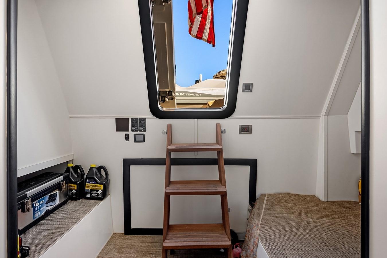 a wooden chair in a room aboard THRU & THRU Yacht for Sale