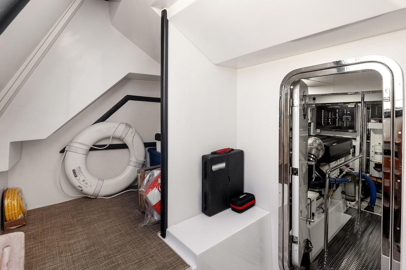 a room with a fan and a fan aboard THRU & THRU Yacht for Sale