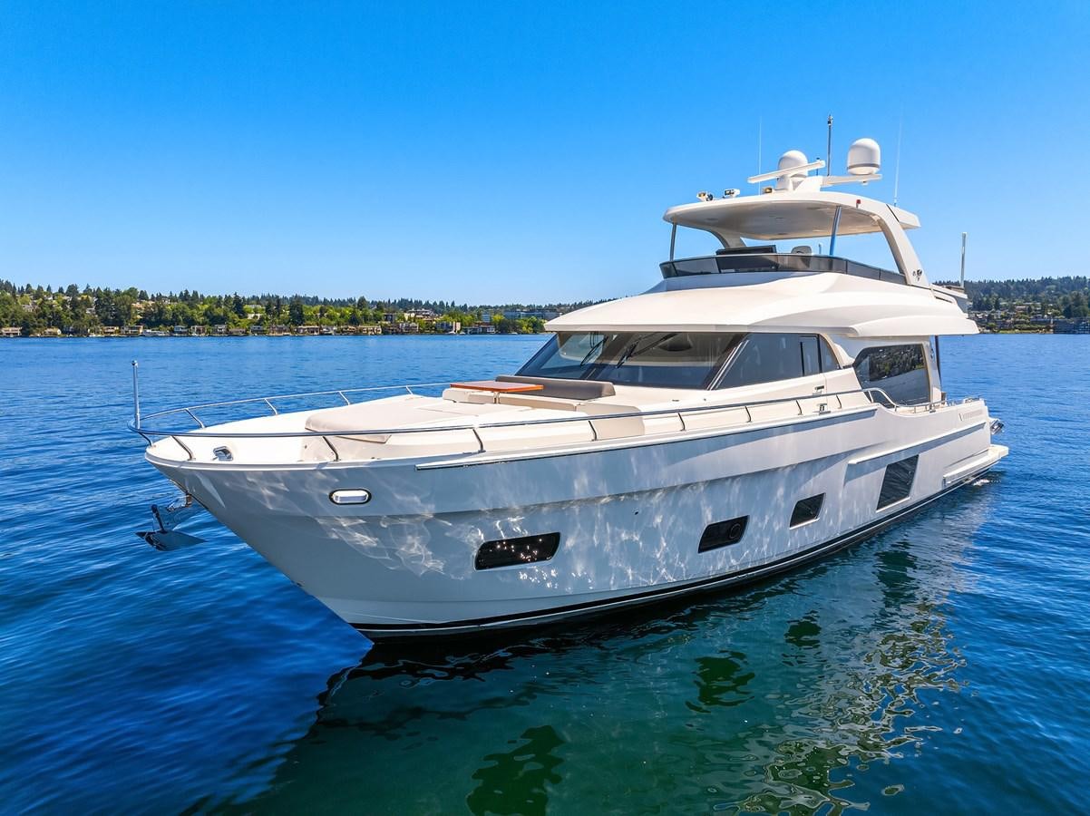 a white yacht on the water aboard THRU & THRU Yacht for Sale