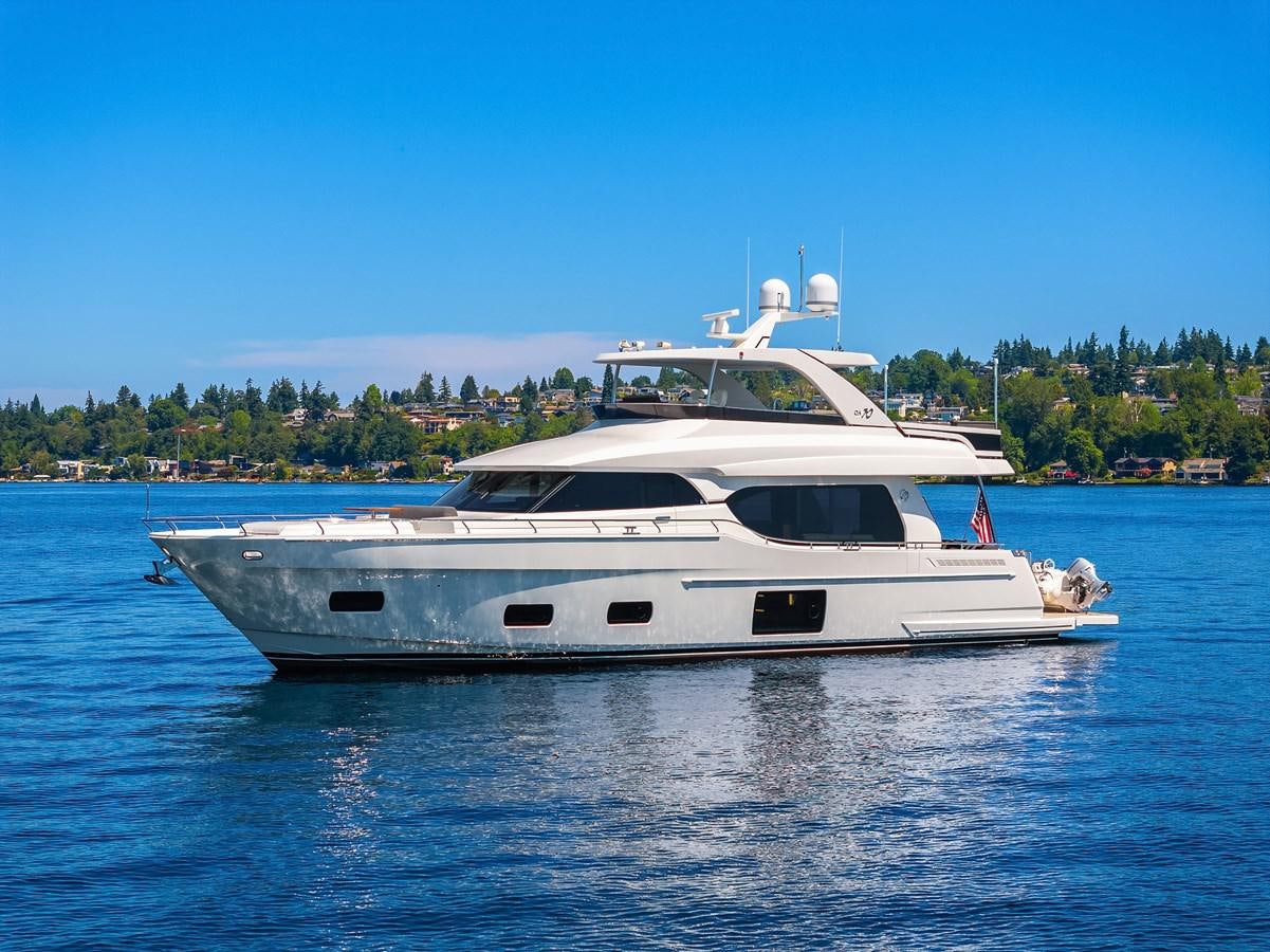 a white yacht on the water aboard THRU & THRU Yacht for Sale