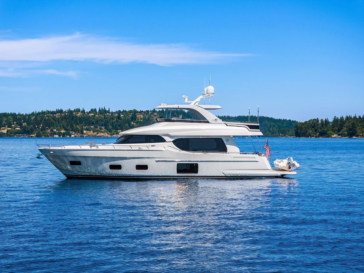 a white yacht on the water aboard THRU & THRU Yacht for Sale