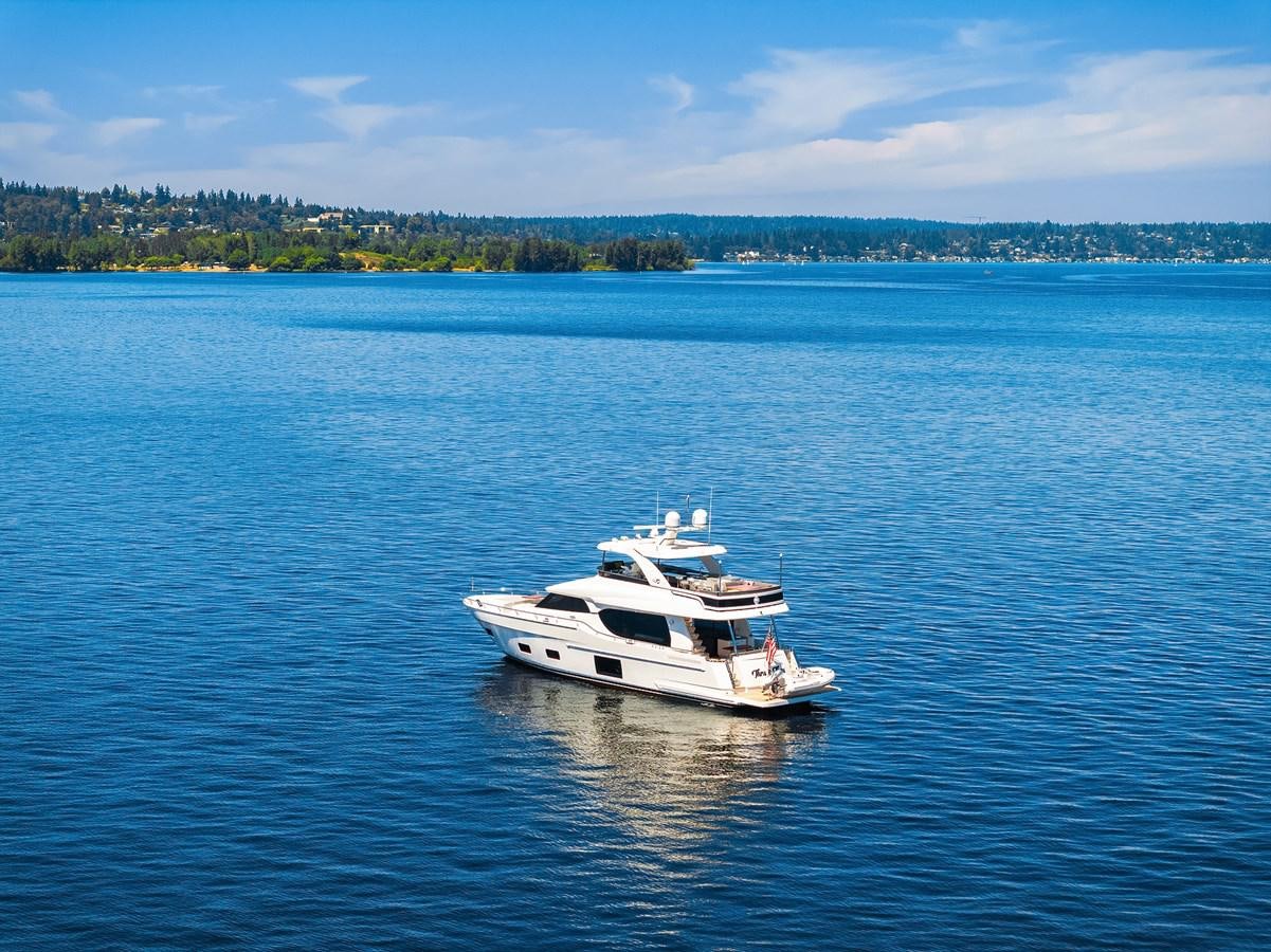 a white boat in the water aboard THRU & THRU Yacht for Sale