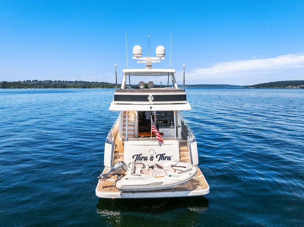 a boat in the water aboard THRU & THRU Yacht for Sale