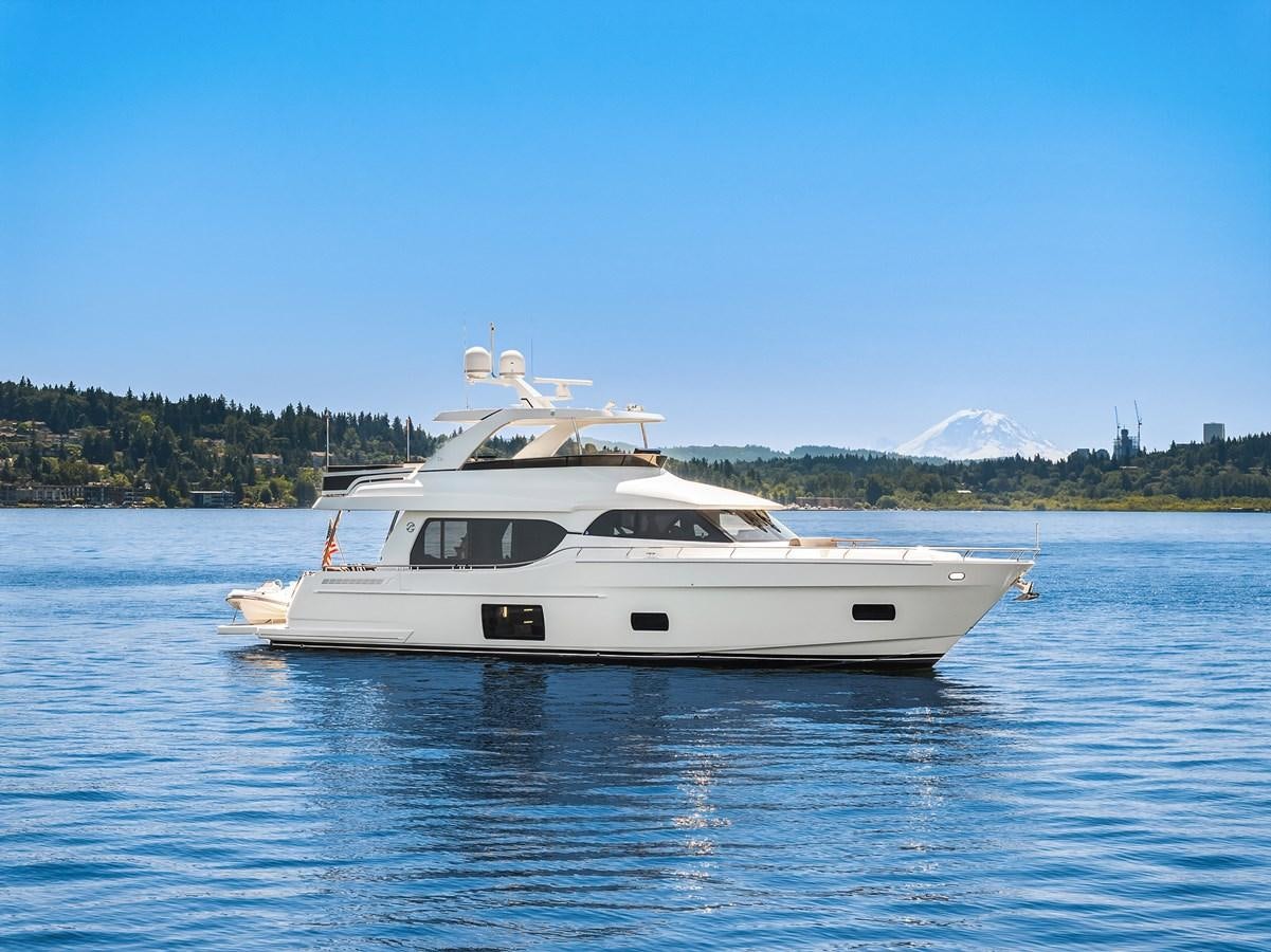 a white boat on water aboard THRU & THRU Yacht for Sale