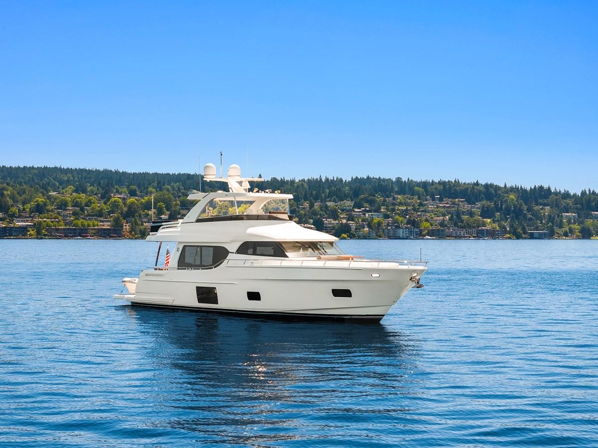 a white boat on the water aboard THRU & THRU Yacht for Sale