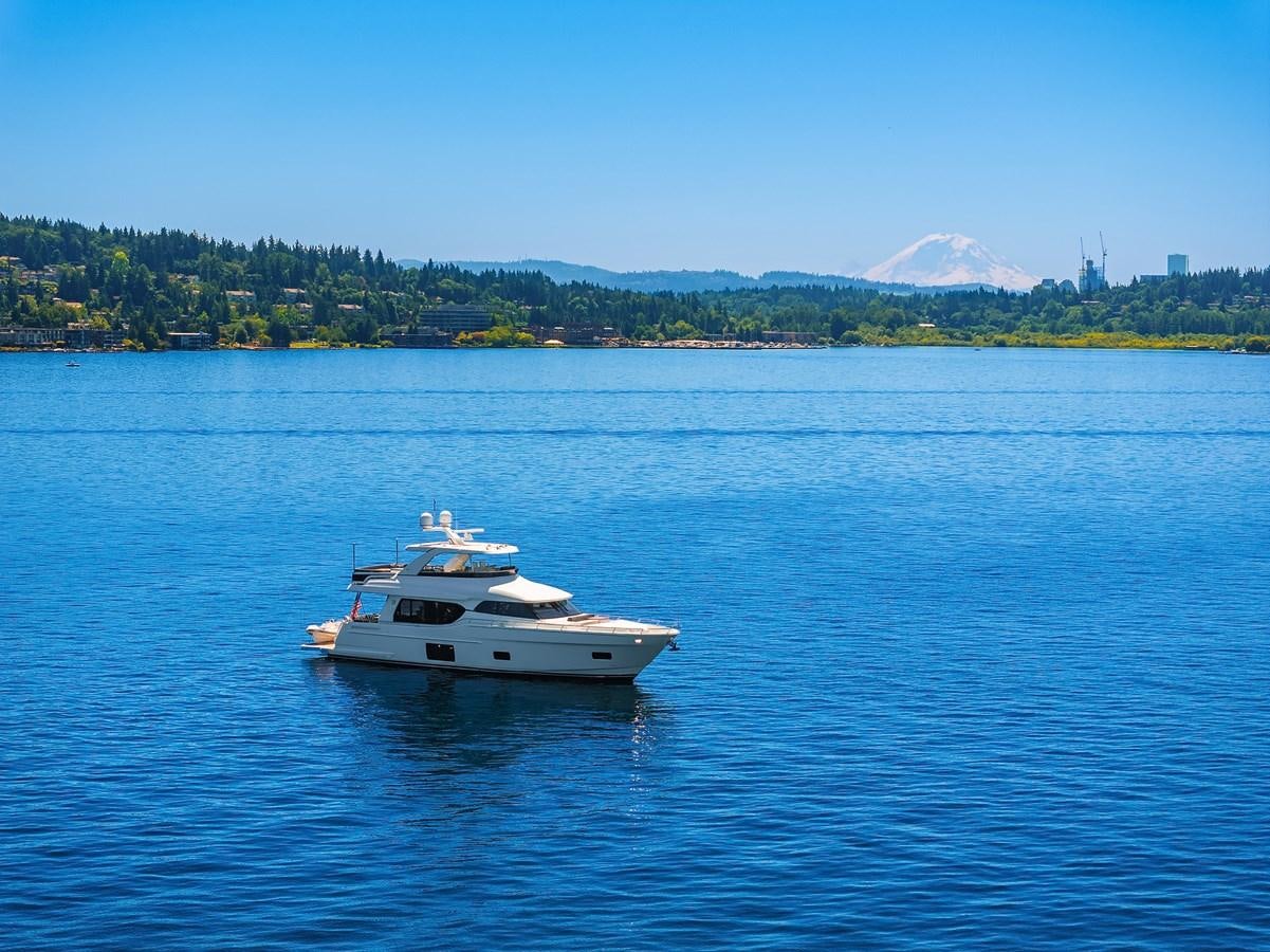 a white boat on the water aboard THRU & THRU Yacht for Sale