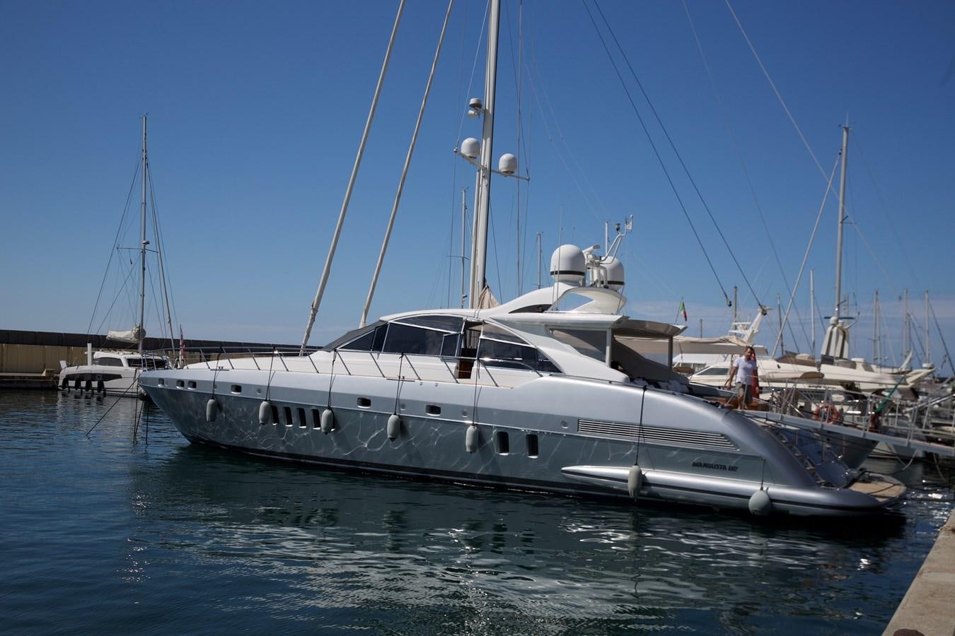 a boat docked at a pier aboard SILVER SKY Yacht for Sale