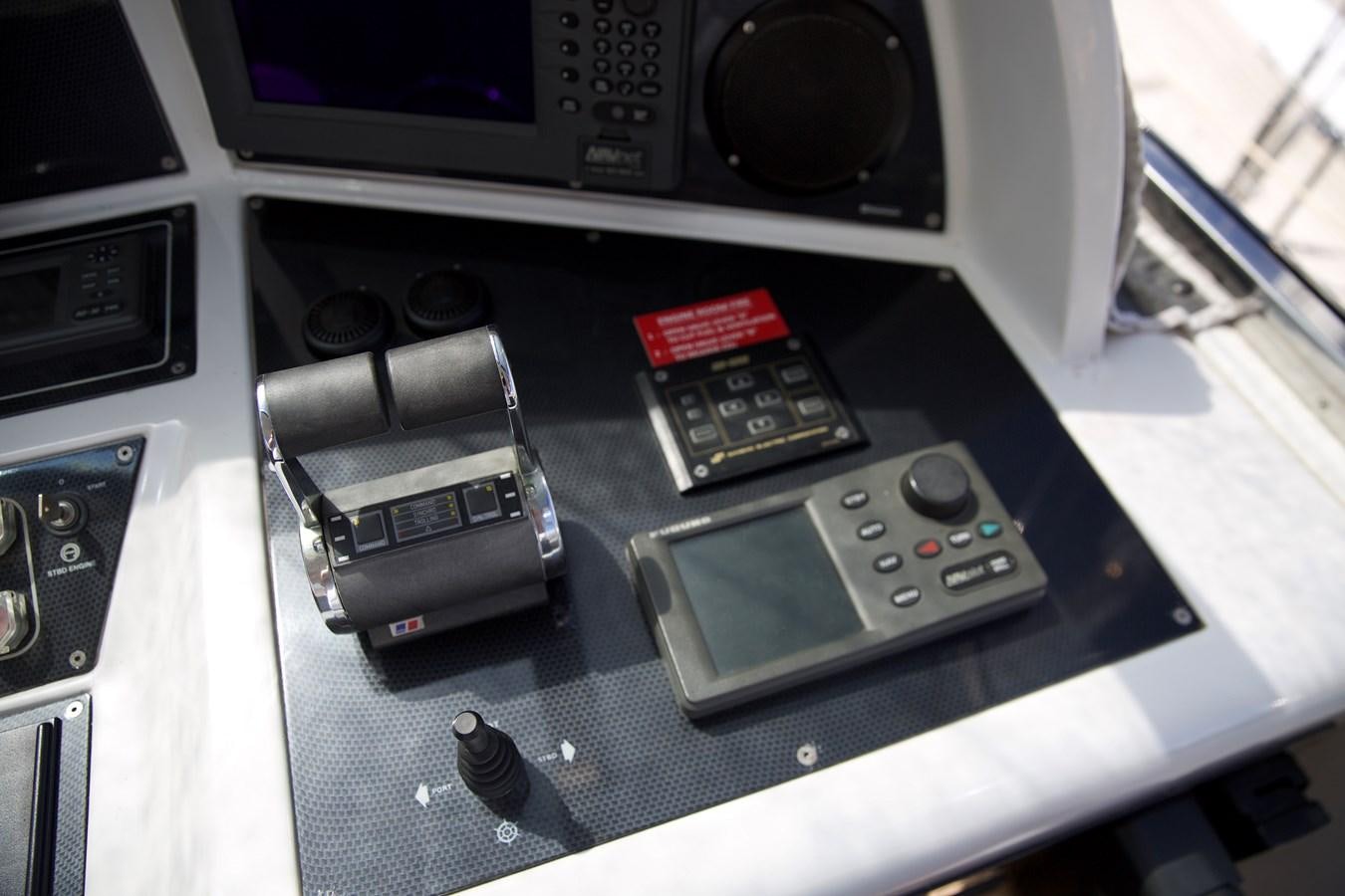 a group of electronic devices on a table aboard SILVER SKY Yacht for Sale
