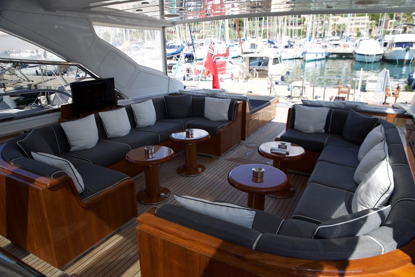 a room with couches and tables aboard SILVER SKY Yacht for Sale