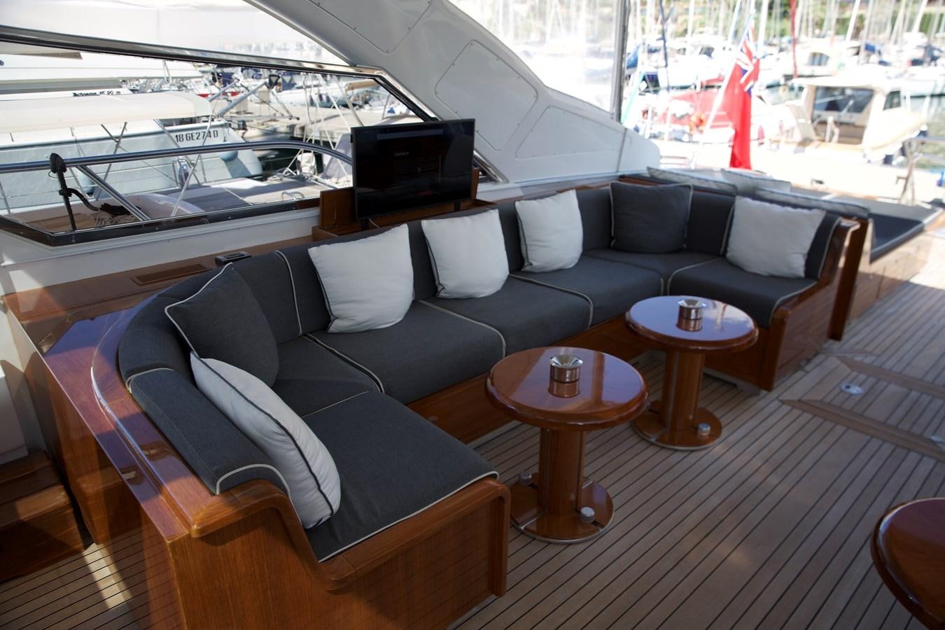 a living room with a couch and a table aboard SILVER SKY Yacht for Sale