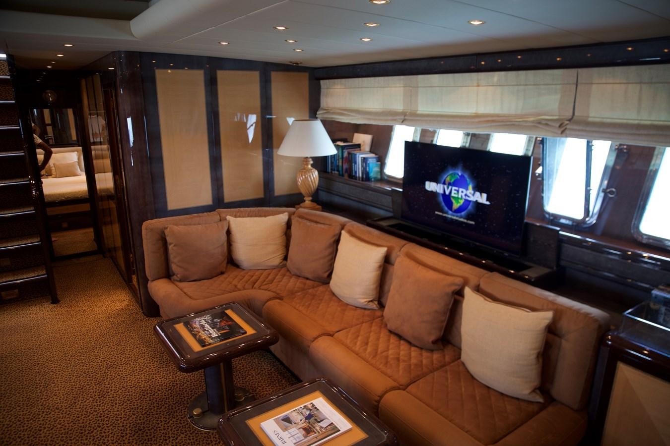 a living room with a large screen aboard SILVER SKY Yacht for Sale