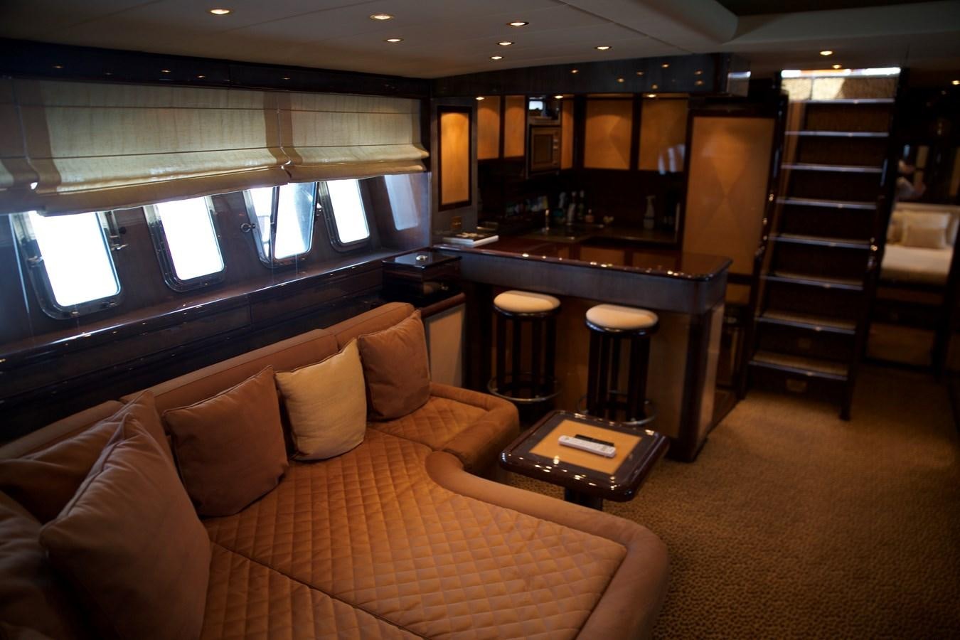 a living room with a couch and a table aboard SILVER SKY Yacht for Sale