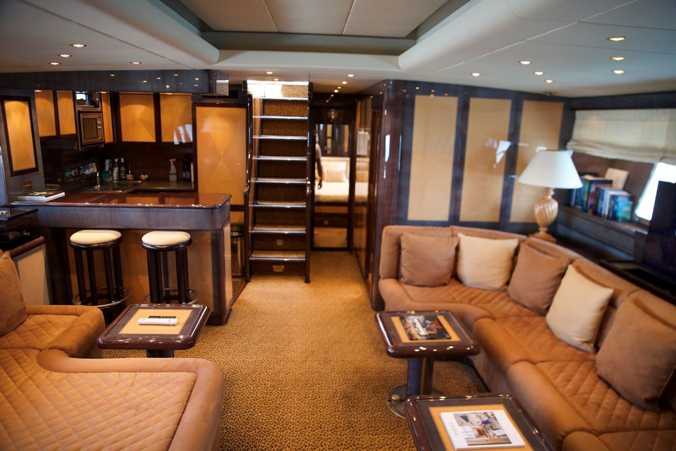 a living room with a staircase aboard SILVER SKY Yacht for Sale
